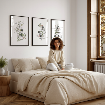 Bright Scandi style small bedroom with minimalist wall art and calming decor above the bed