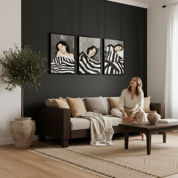 Serene minimalist living room with a single large woven wall hanging above a wooden shelf, demonstrating bohemian art in minimalist homes.