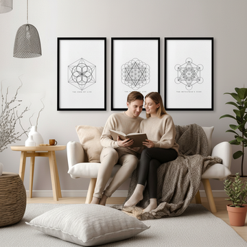 Interior designer small space — couple on sofa in Scandi living room with sacred geometry wall art
