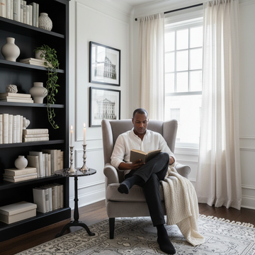 A curated living room showing the best wall art for neutral furniture in a calm Scandi-inspired space