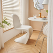 1. Aimee white dining chair beside a window and round table