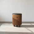 1. Ava Luxe black marble bedside table in sunlight