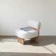 1. Evander white boucle chair in sunlight