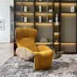 10. Abt mustard swivel recliner front view
