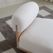 10. Evander boucle backrest and wooden frame detail