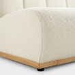 11. Zafar bouclé upholstery and oak base detail