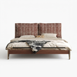 13. Arendt bed with patterned headboard on a white background