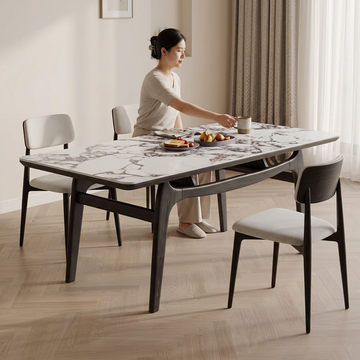 14. Dobson dining table with a person having breakfast