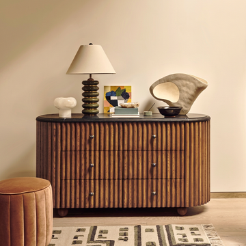 2. Ava black marble sideboard with decorative accessories