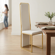 2. Deana gold frame dining chair in an ivory dining room with a person in the background