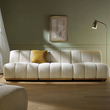 2. Yilmaz modular sofa with a mustard cushion