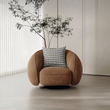 3. Abreu brown swivel armchair viewed from the front beside a tree
