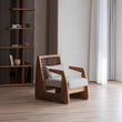 3. Delaney armchair beside sheer curtains