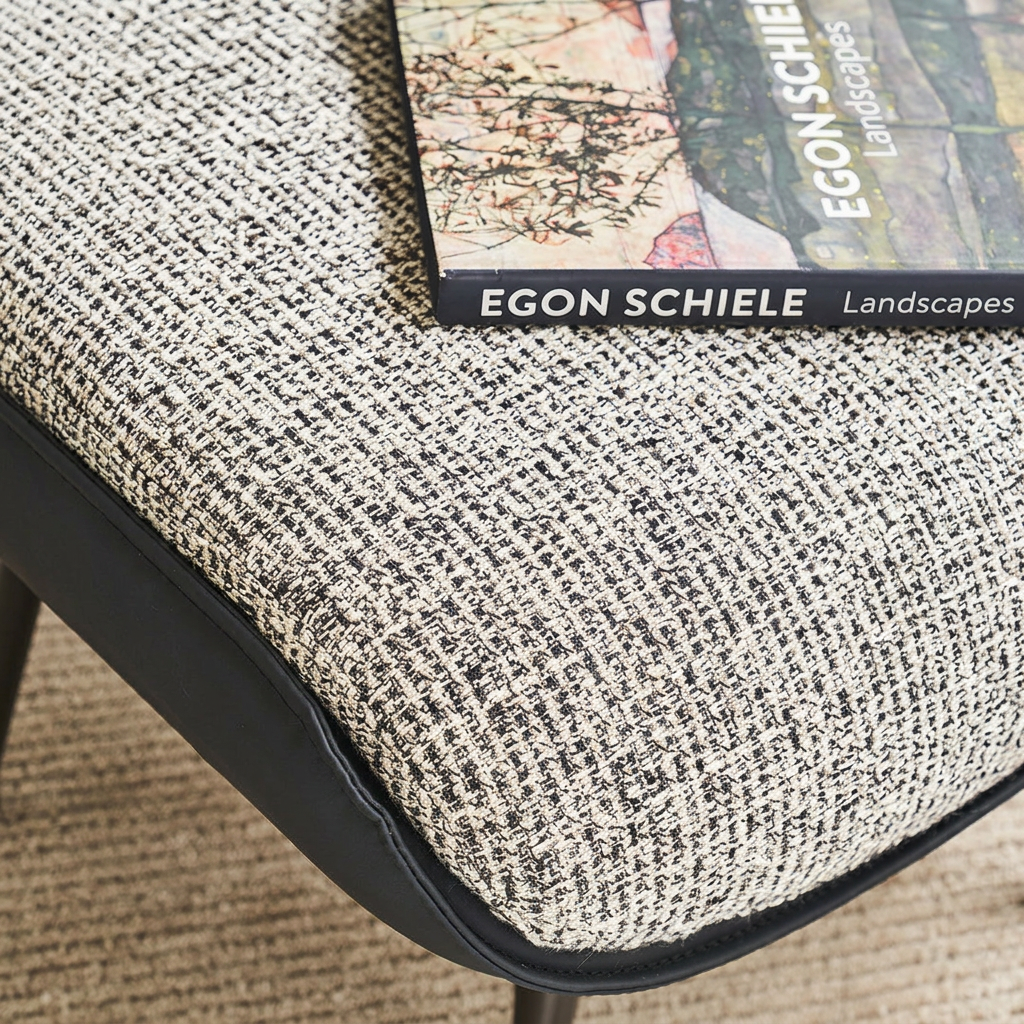 3. Diakite footstool upholstery and leather edge detail