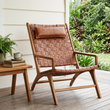 3. Kendari brown woven leather chair on a sheltered garden veranda