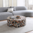 3. Zahra coffee table beside a grey sofa