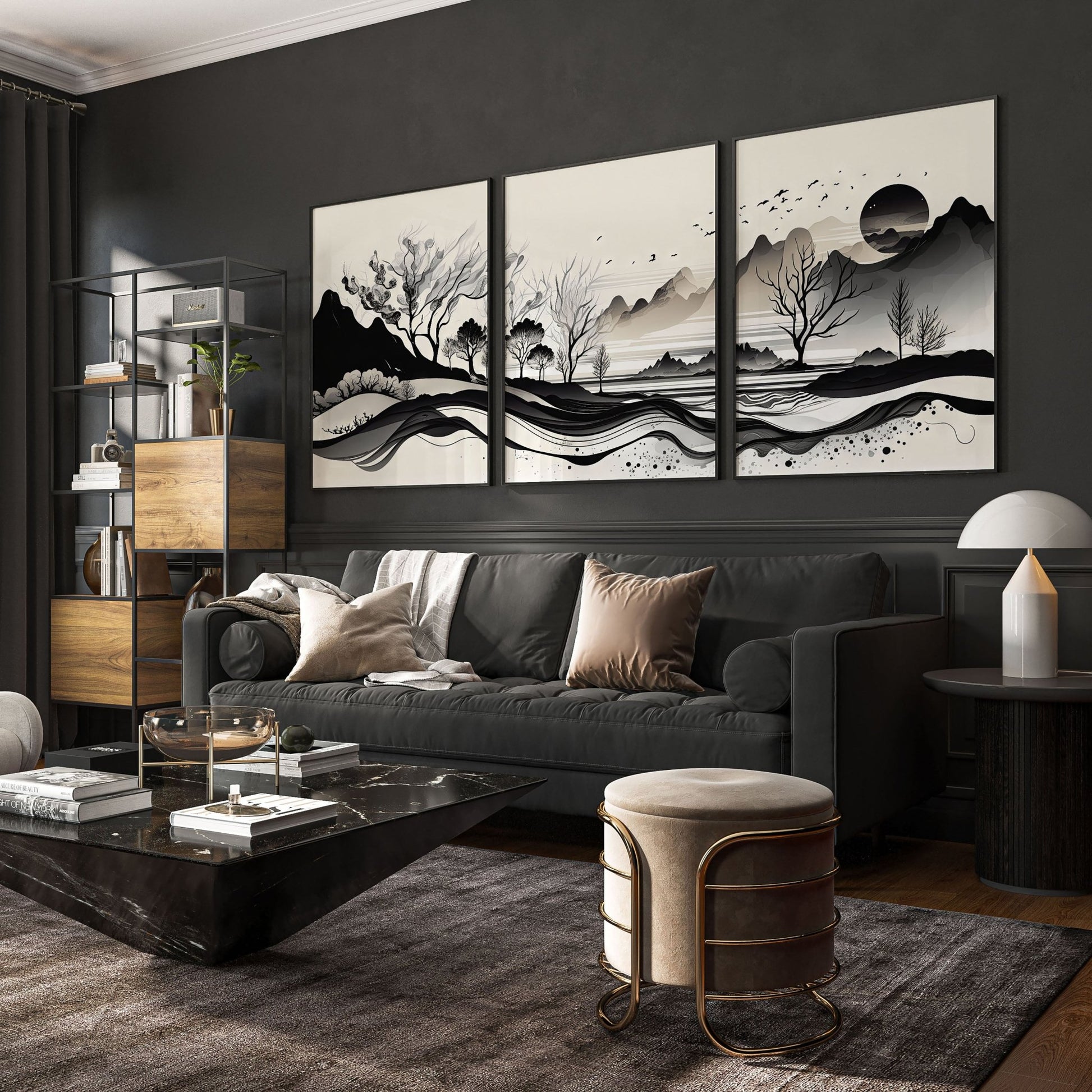 3 large pictures on wall above a grey sofa in a sophisticated dark living room