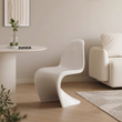 4. Aimee white dining chair beside a sofa