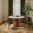 4. Kennedy dark oak dining chairs around a round marble table
