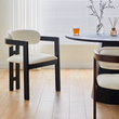 4. Sara black dining chair at a dining table