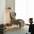 6. Abt neutral swivel recliner beside a window