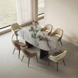 6. Bianchi dining chairs around a marble dining table