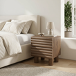 9. Clancy wooden bedside table in a contemporary ivory bedroom