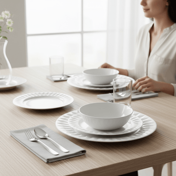 Avie 16 Piece White Embossed Dinner Set.