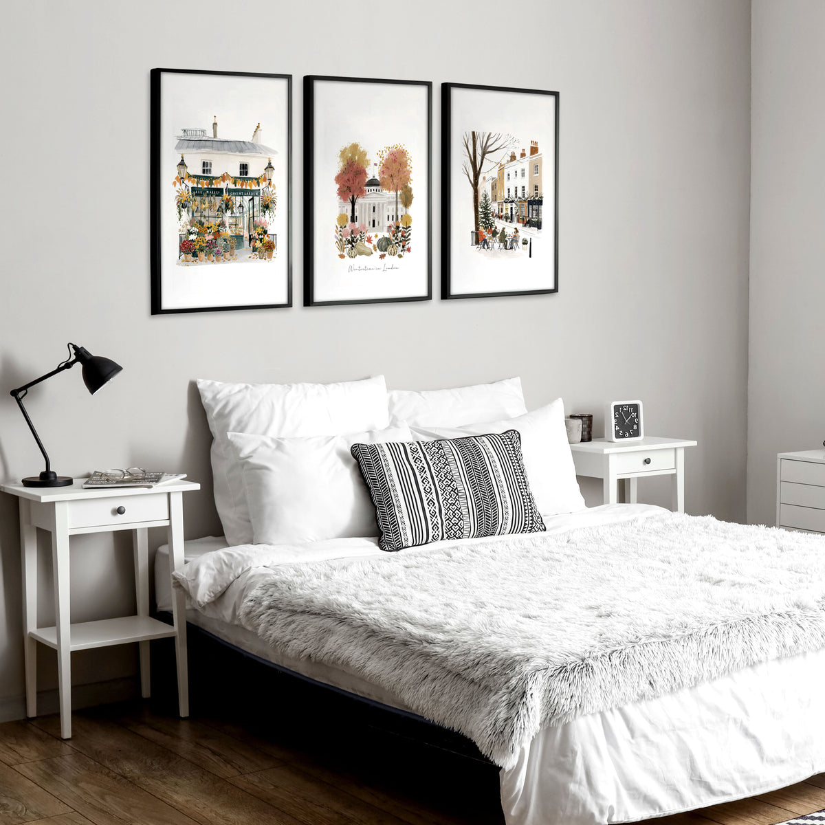 Bedroom Wall Frames London Travel Art | "Wintertime in London" Covent Garden White & Orange Set of 3 displayed on a wall in a styled room — view 8