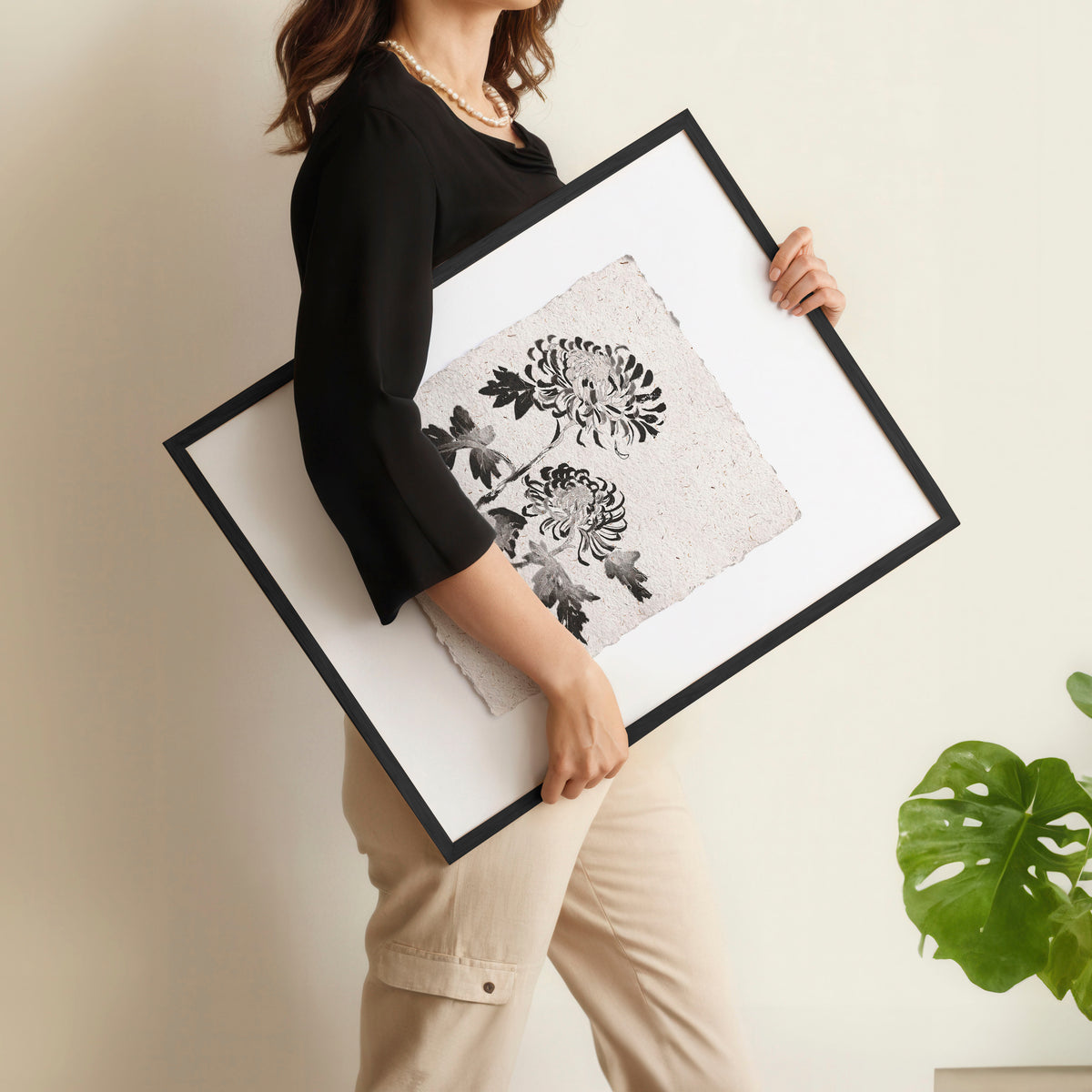 Beige Wall Art Botanical Pressed Flower & Leaf wall art displayed on a wall in a styled room