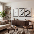 Big Living Room Wall Art Japandi Zen Ink Brushstroke Solitary Figure White Black Gold-Toned displayed on a wall in a styled room — view 11
