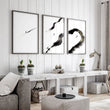 Big Living Room Wall Art Japandi Zen Ink Brushstroke Solitary Figure White Black Gold-Toned displayed on a wall in a styled room — view 13