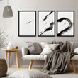 Big Living Room Wall Art Japandi Zen Ink Brushstroke Solitary Figure White Black Gold-Toned displayed on a wall in a styled room — view 7