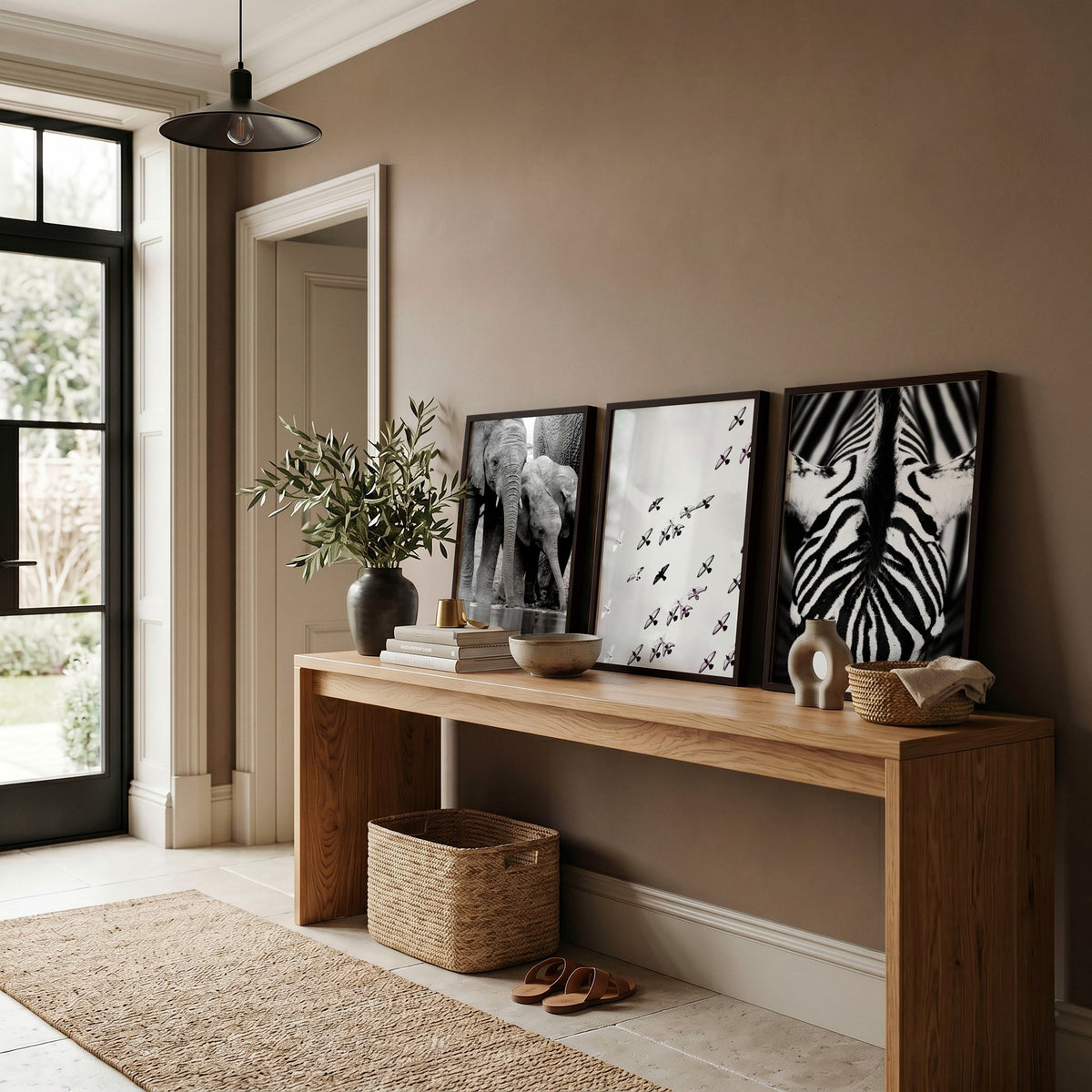 Black and White Photography Wildlife wall art | Elephants, Birds & Zebra displayed on a wall in a styled room