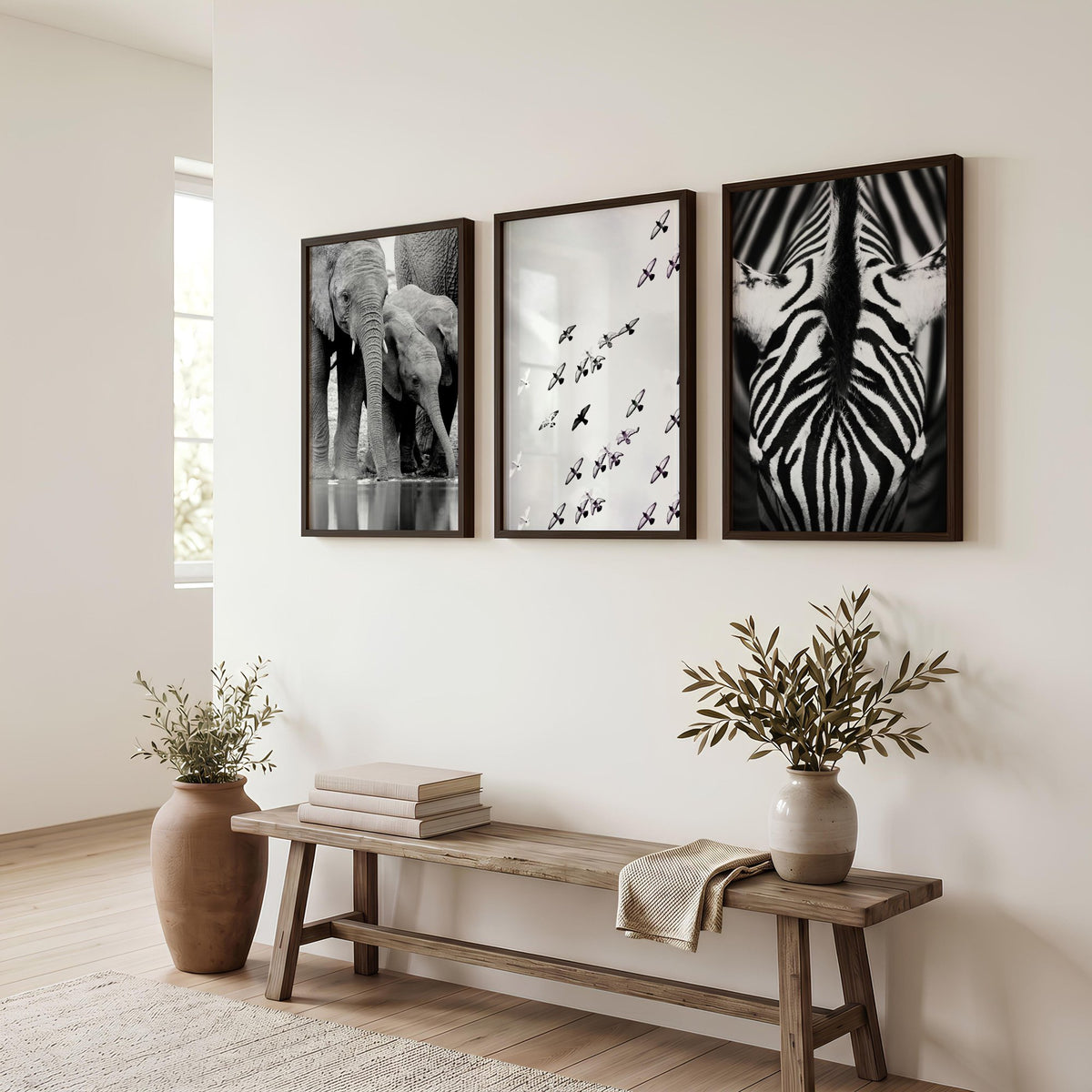 Black and White Photography Wildlife wall art | Elephants, Birds & Zebra displayed on a wall in a styled room — view 2