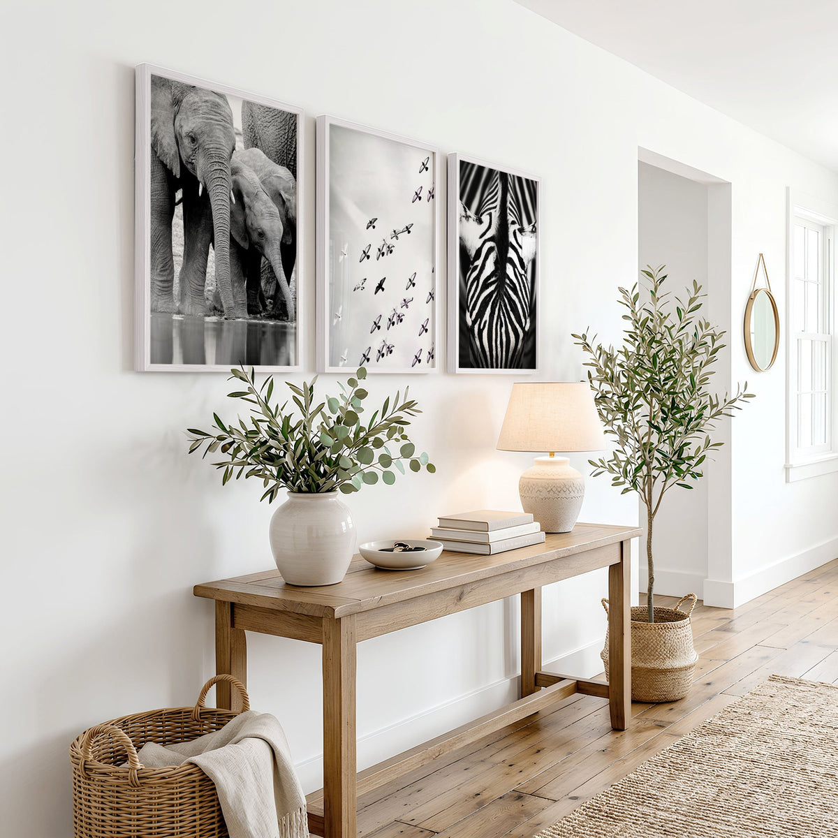 Black and White Photography Wildlife wall art | Elephants, Birds & Zebra displayed on a wall in a styled room — view 5