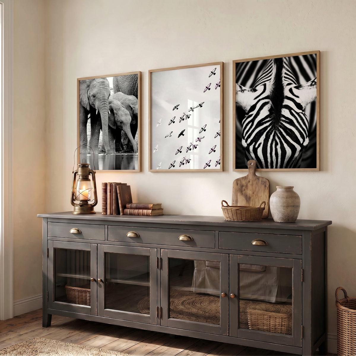 Black and White Photography Wildlife wall art | Elephants, Birds & Zebra displayed on a wall in a styled room — view 6