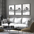 Black and White wall art for Living Room | Japanese Ink Landscape with Red Moon displayed on a wall in a styled room