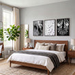 Black White Photography wall art | African Wildlife Elephants Zebra Birds Wall Art displayed on a wall in a styled room