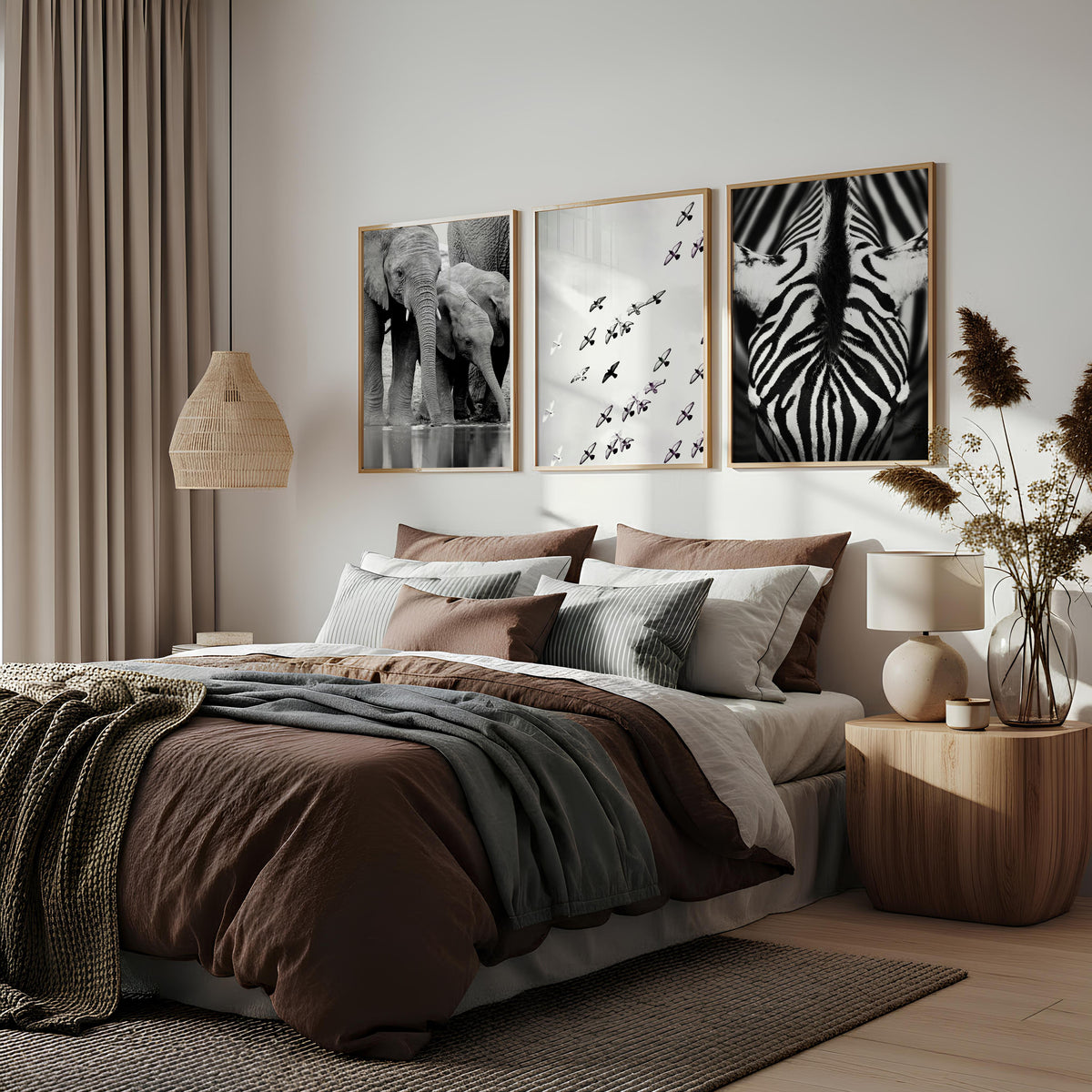Black White Photography wall art | African Wildlife Elephants Zebra Birds Wall Art displayed on a wall in a styled room — view 2