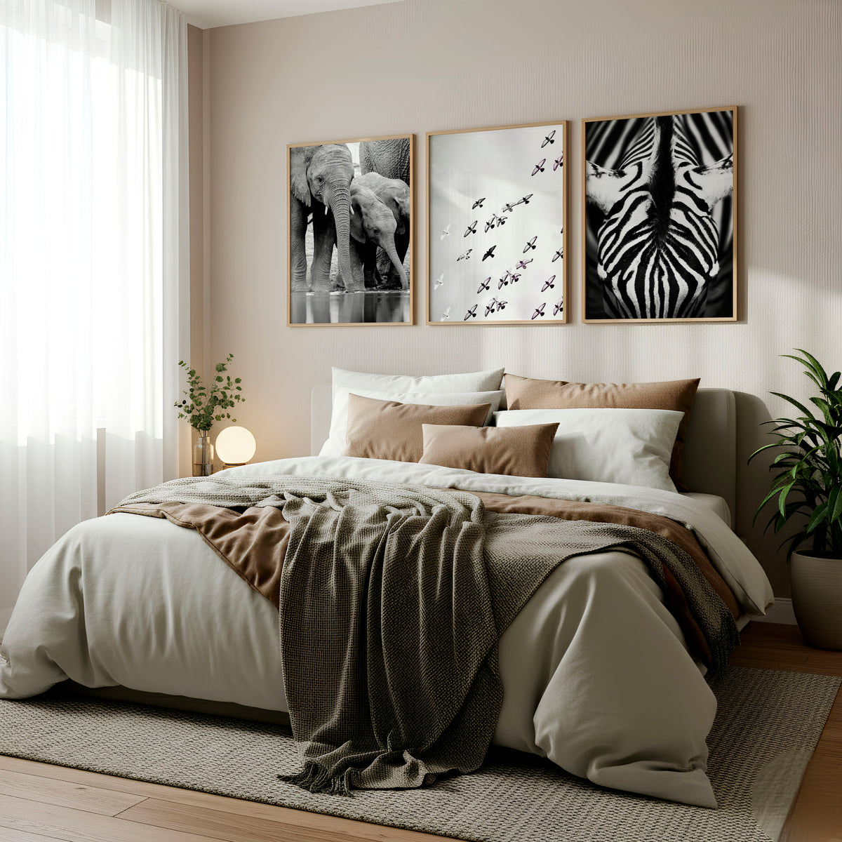 Black White Photography wall art | African Wildlife Elephants Zebra Birds Wall Art displayed on a wall in a styled room — view 3