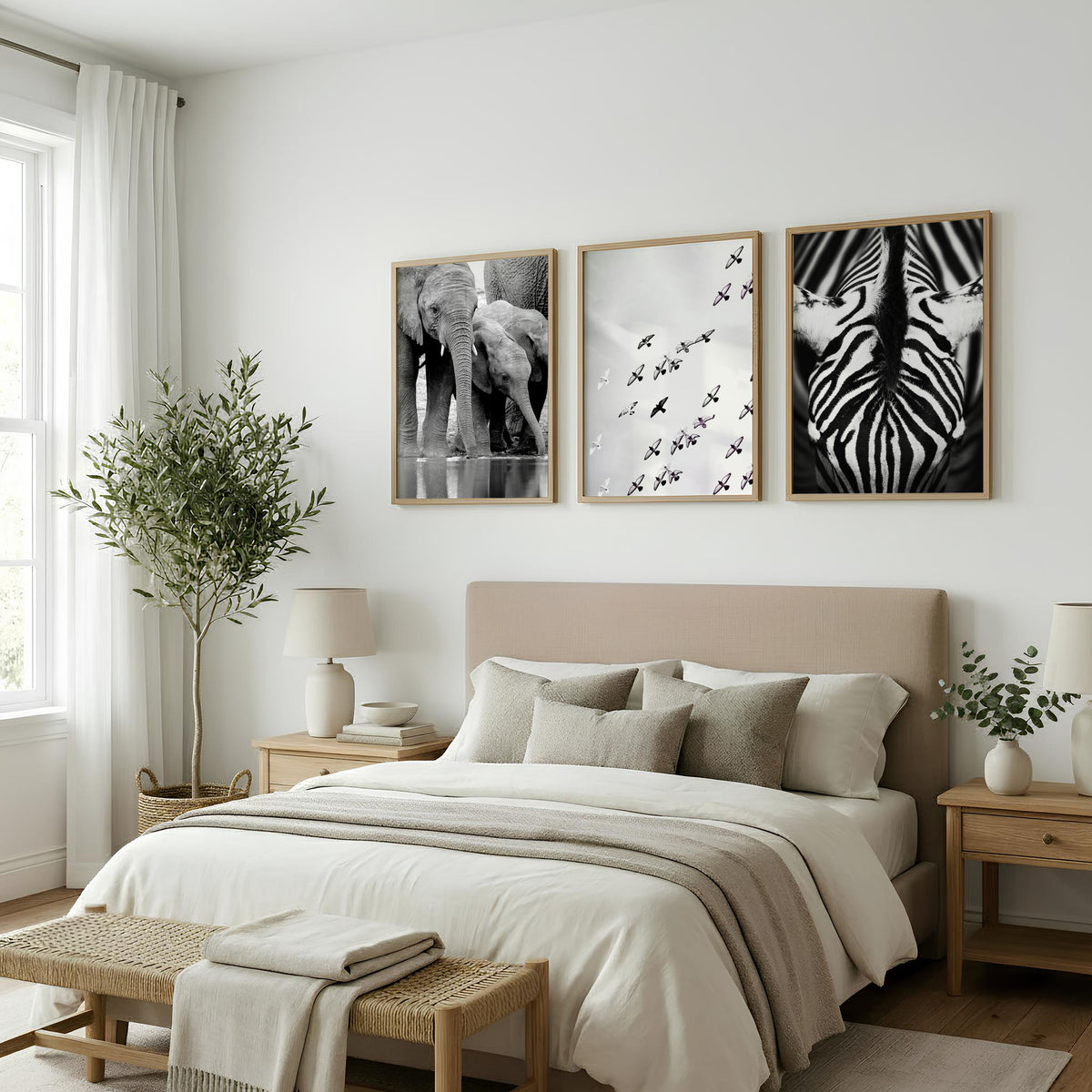 Black White Photography wall art | African Wildlife Elephants Zebra Birds Wall Art displayed on a wall in a styled room — view 6