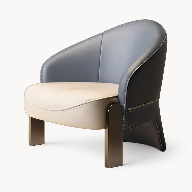 A modern barrel-style accent chair with a curved backrest upholstered in light blue and dark brown leather, a cream-colored seat cushion, and dark brown wooden legs, shown against a plain white background.