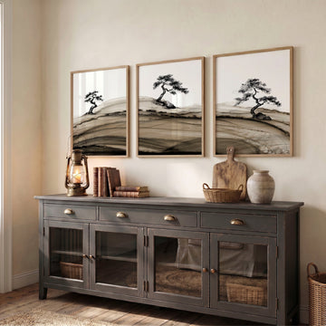 Framed Asian Wall Art Japanese Ink Bonsai Pine Trees on Rolling Hills displayed on a wall in a styled room