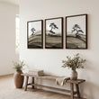 Framed Asian Wall Art Japanese Ink Bonsai Pine Trees on Rolling Hills displayed on a wall in a styled room — view 2