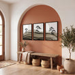 Framed Asian Wall Art Japanese Ink Bonsai Pine Trees on Rolling Hills displayed on a wall in a styled room — view 9
