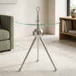 Oria clear glass and silver side table viewed from above at an angle in a contemporary living room
