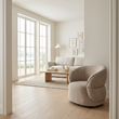 Daphne taupe chenille effect curved chair beside a window in a wide Scandinavian living room view