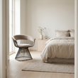Vogue mink velvet chair beside a bedroom window in a wide room view