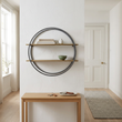 Korba matte gold and grey wall shelf in a Scandinavian hallway